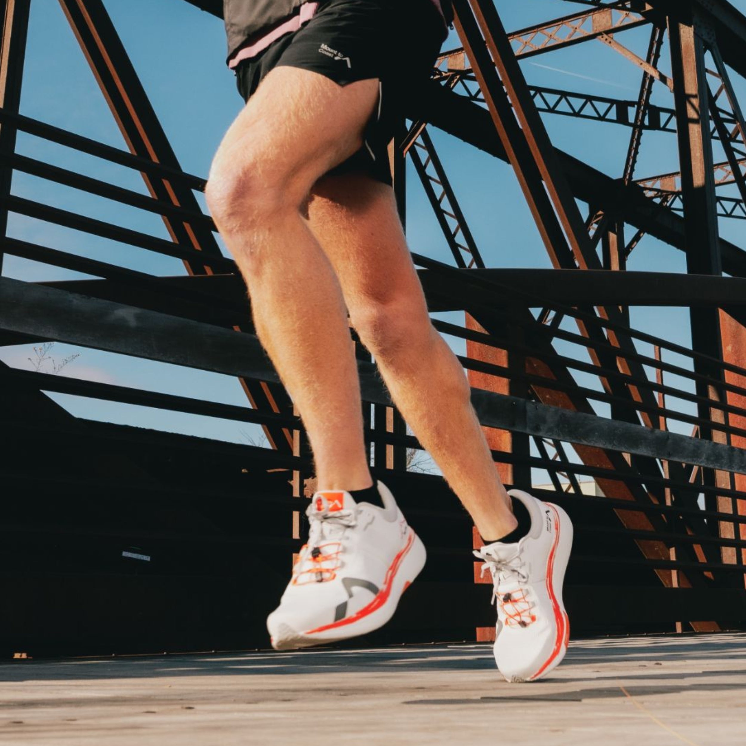 Runner wearing Mount to Coast R1 Cam shoes #Color_cam