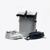 Urban Running Kit: Running shoes, backpack and fanny pack.