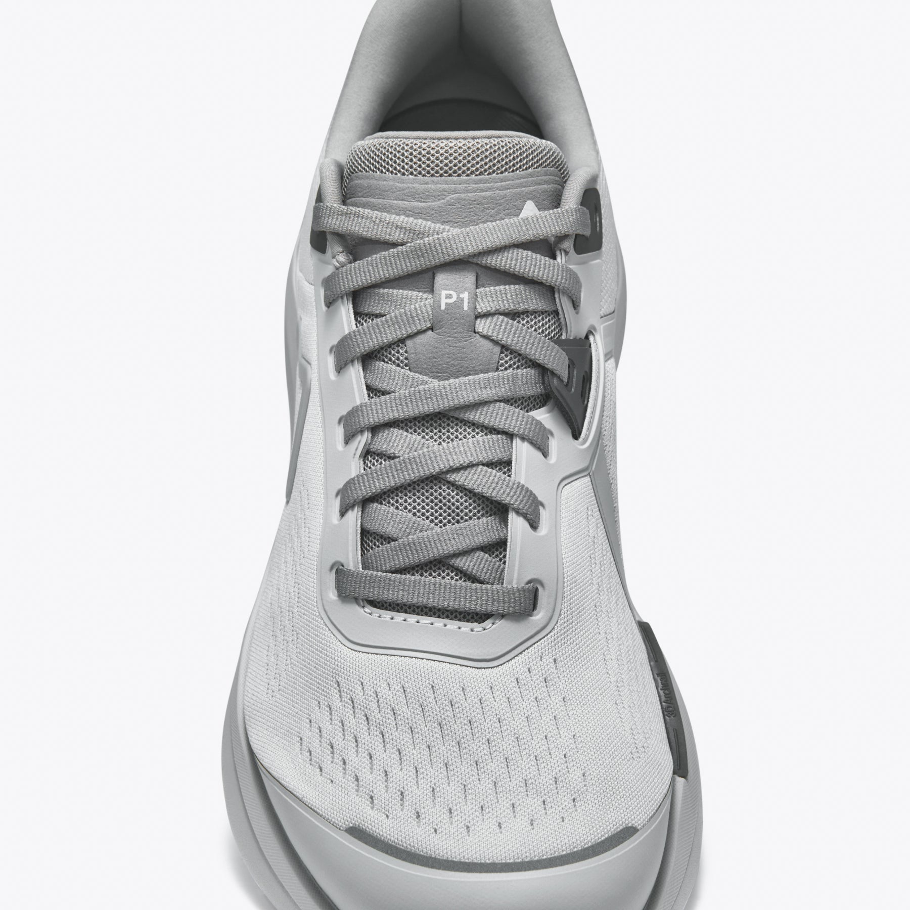 Gray running shoe, close-up detail of laces and mesh