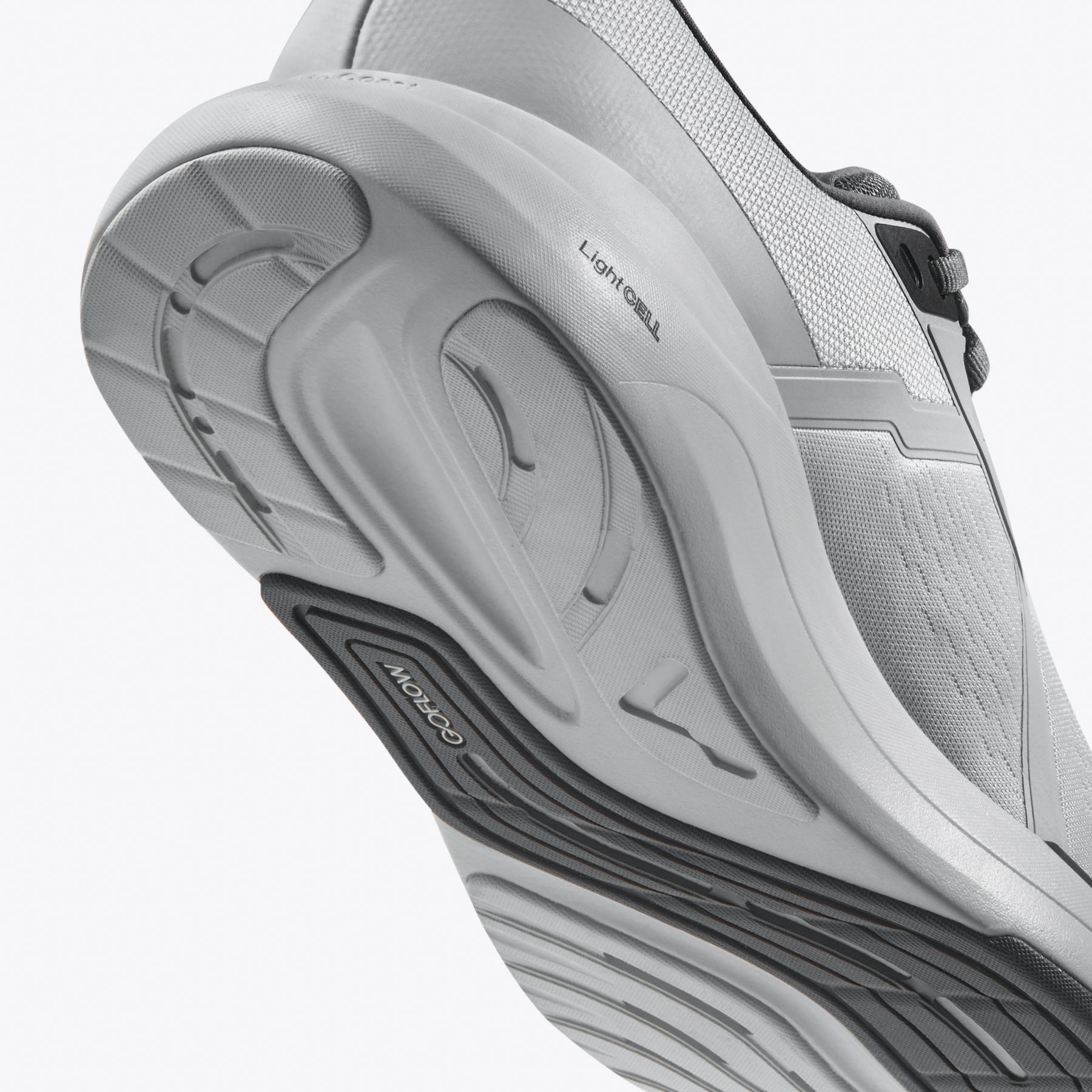 Gray running shoe sole with LIGHT CELL and GOCROW detail