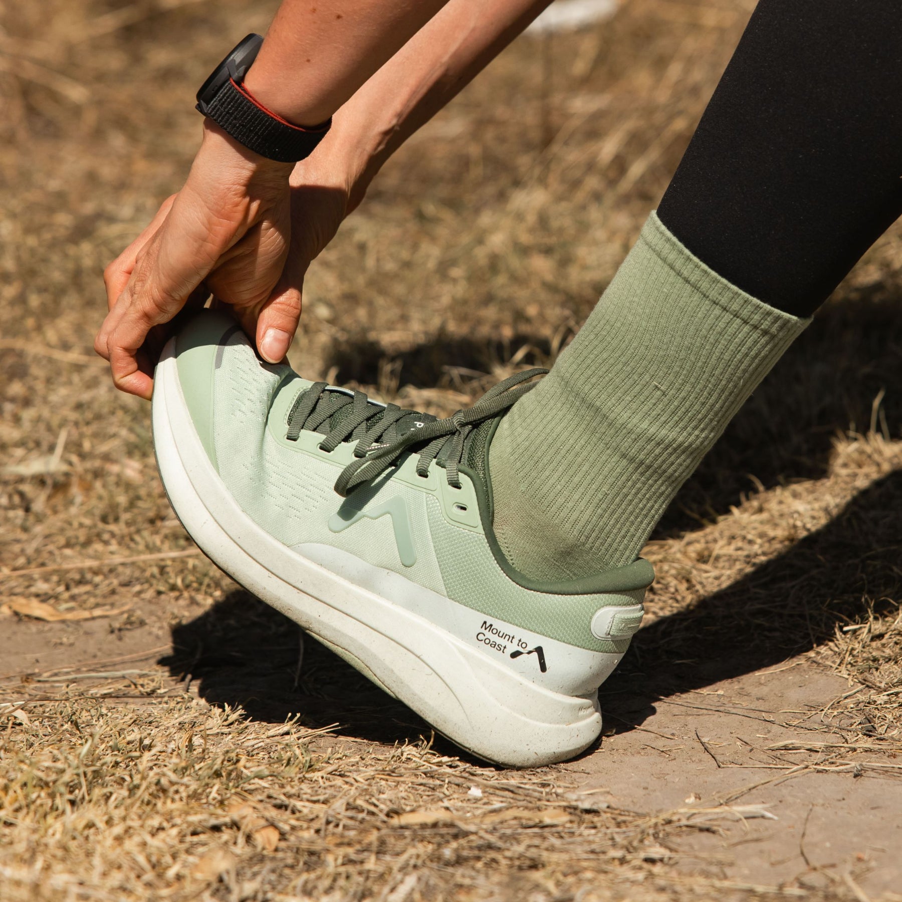 Mount to Coast P1 Agave stability shoe with 3D Archrail technology, runner wearing Agave socks