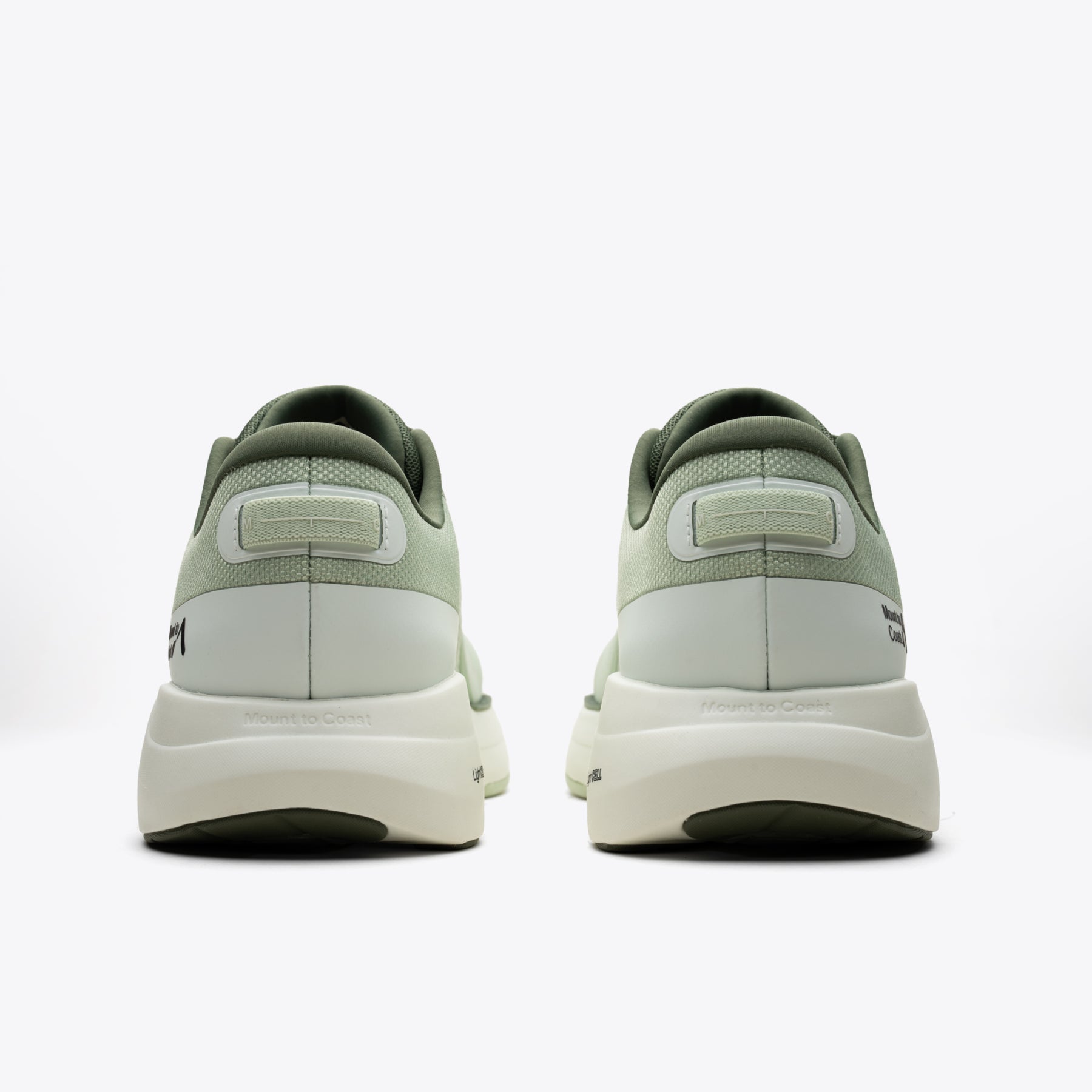 P1 Agave stability running shoe, rear view in light green with Mount to Coast branding.
