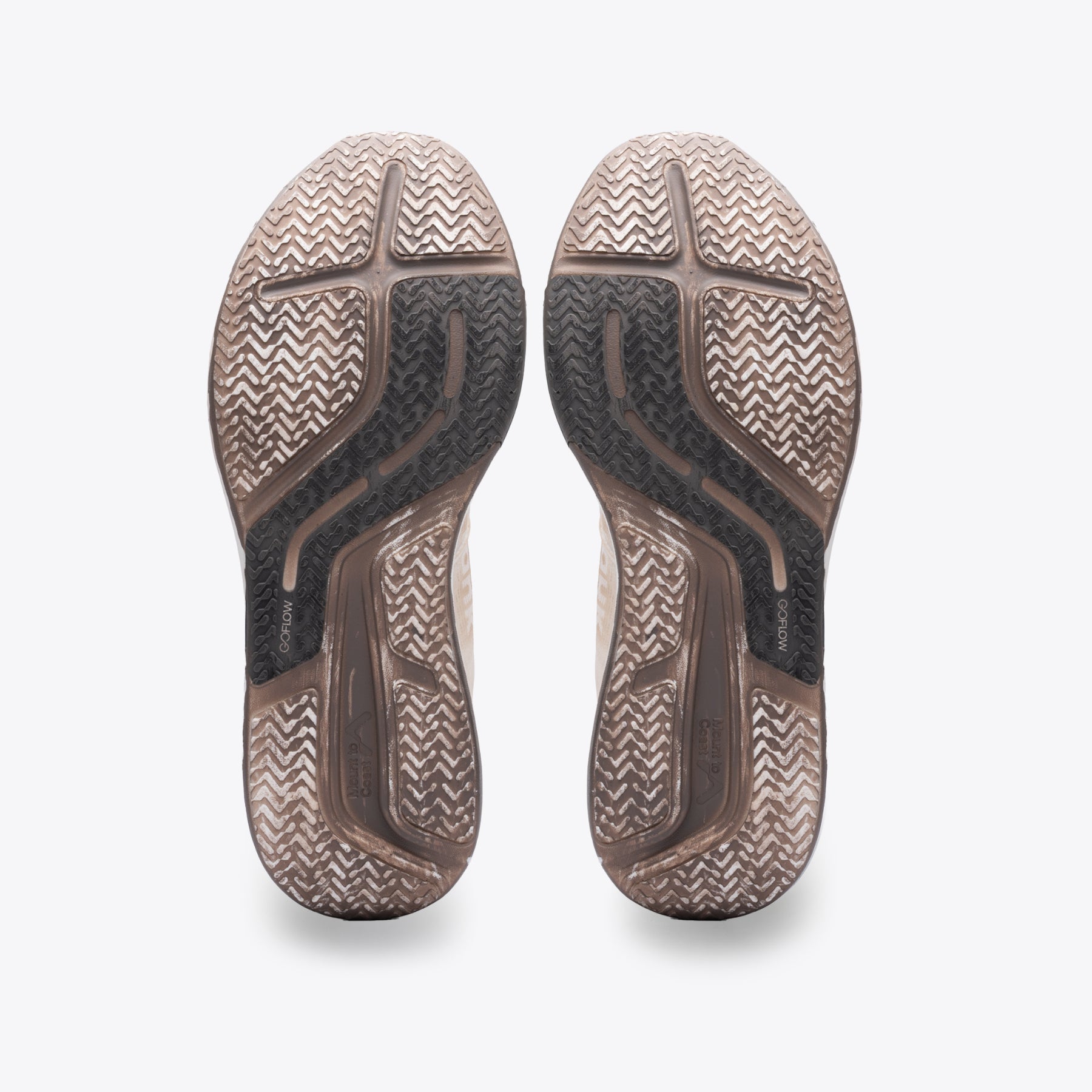 R1 Legacy trail shoe sole, tan/black, "Mount to Coast" branding, for ultrarunners.