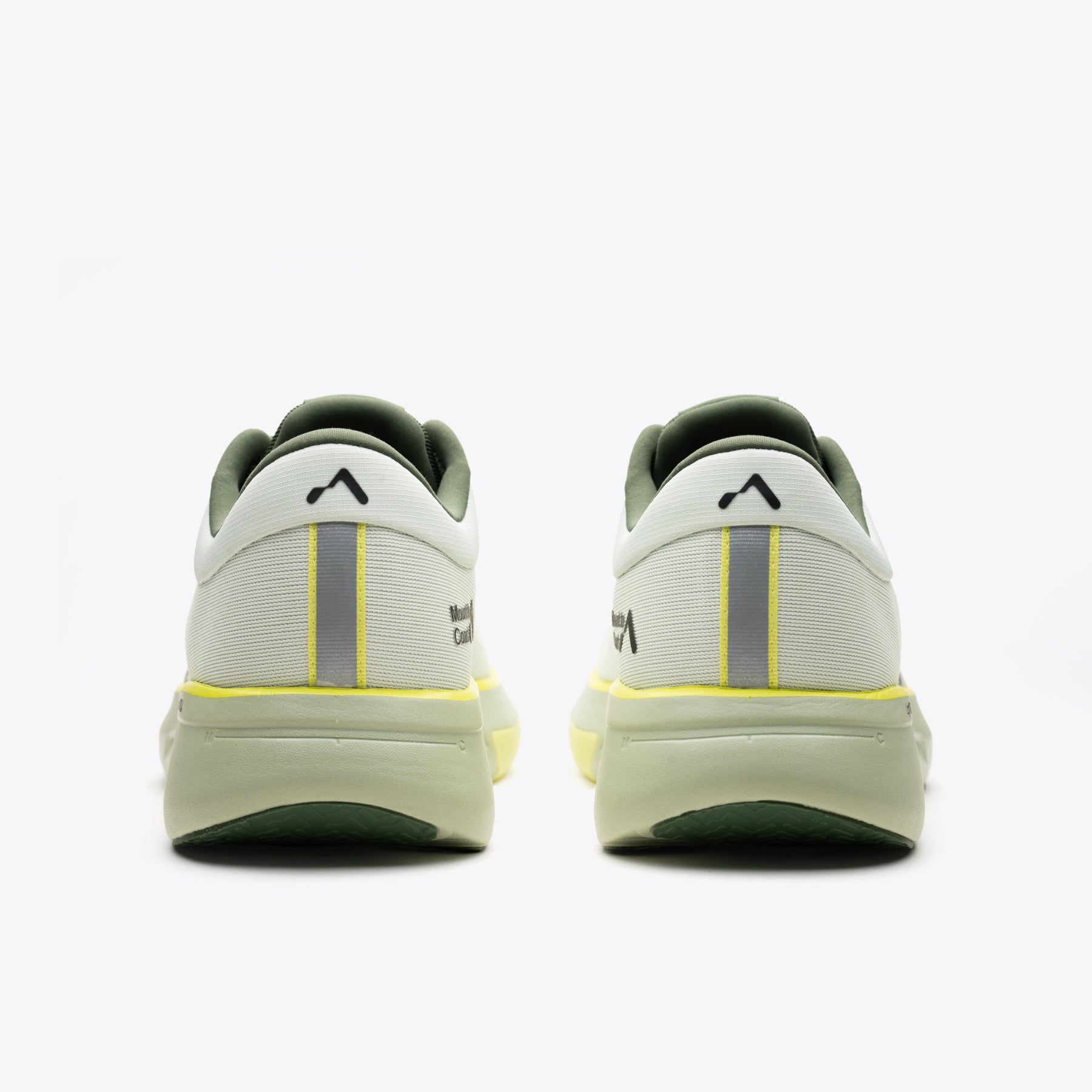 R1 Agave road running shoes, back view. White and green design, Mount to Coast logo, for ultramarathons.