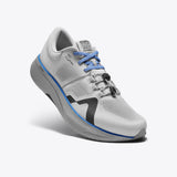 R135 ultra-marathon running shoe in white with blue accents and LightCELL midsole. "BADWATER WORLD'S TOUGHEST" branding.