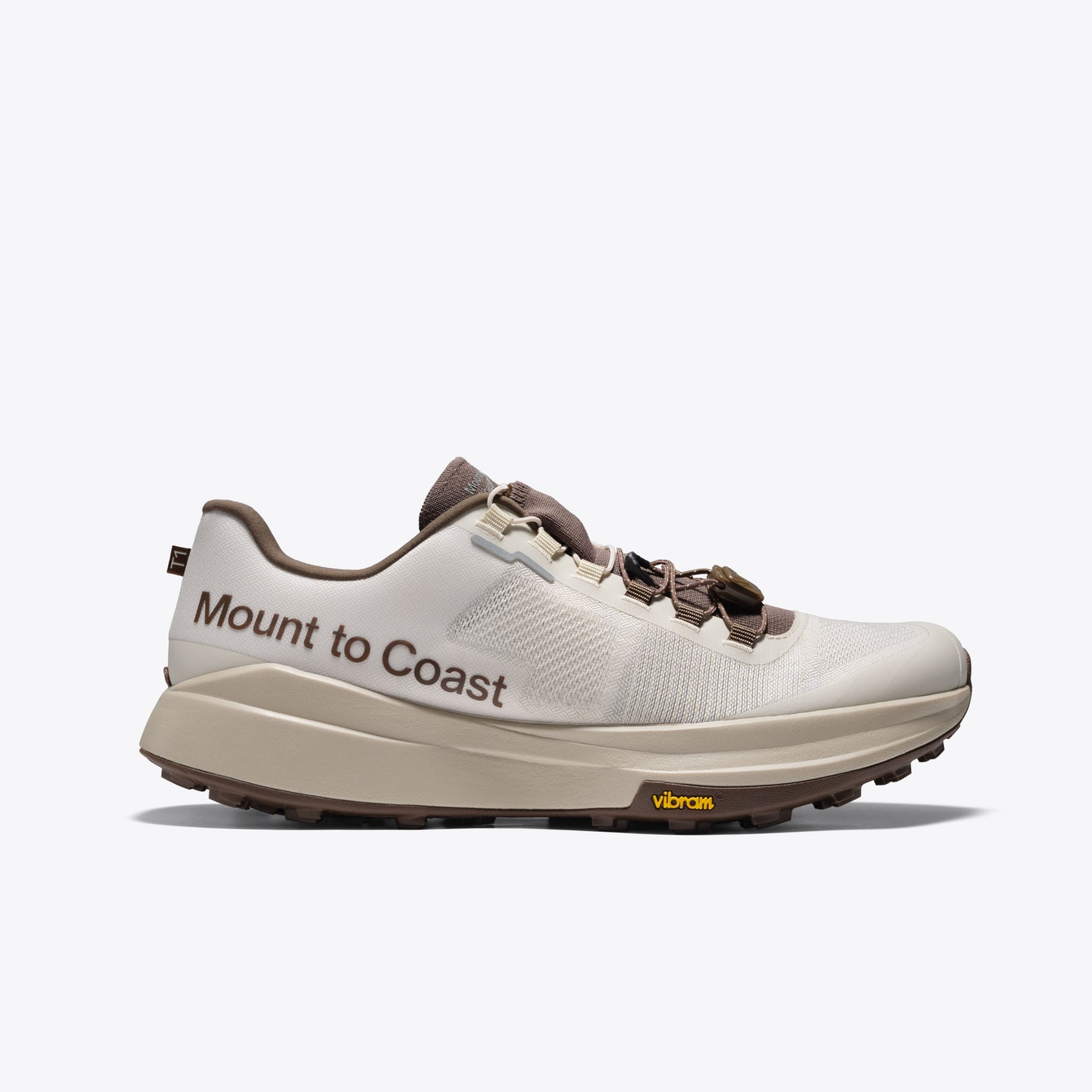 Mount to Coast T1 trail running shoe in beige and brown colorway with Vibram sole.
#Color_dune