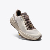 Mount to Coast T1 trail running shoe in beige and brown colorway, featuring Vibram outsole and brand name on the side.
#Color_dune