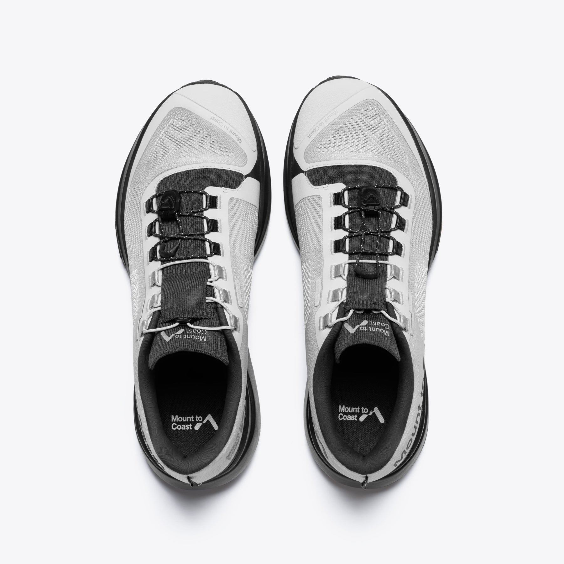 Mount to Coast T1 trail shoes, white and black, for long-distance trail running. Featuring Light Cell technology.
#Color_tephra
