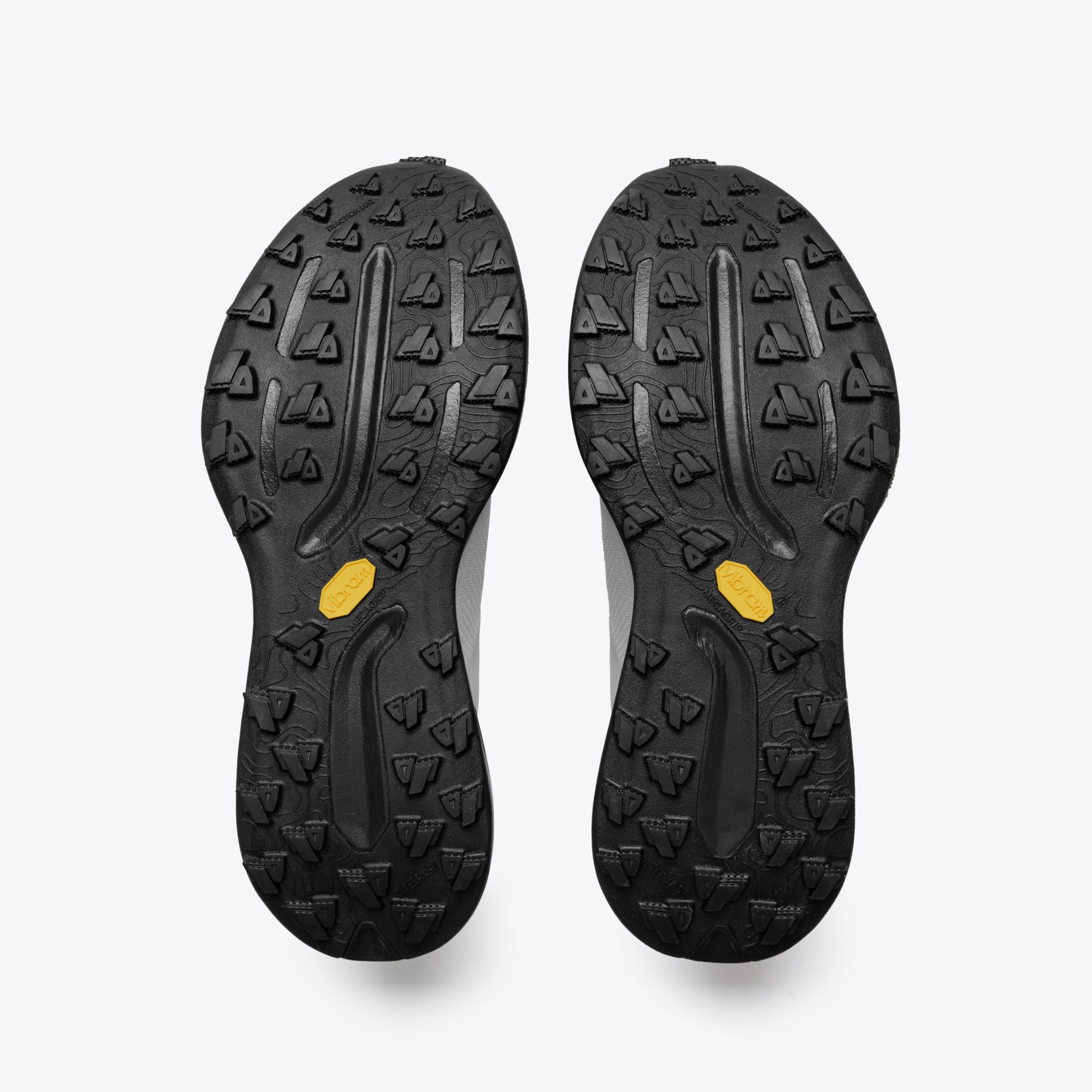 Mount to Coast T1 trail running shoe outsole detail featuring Vibram Megagrip for superior traction.
#Color_tephra