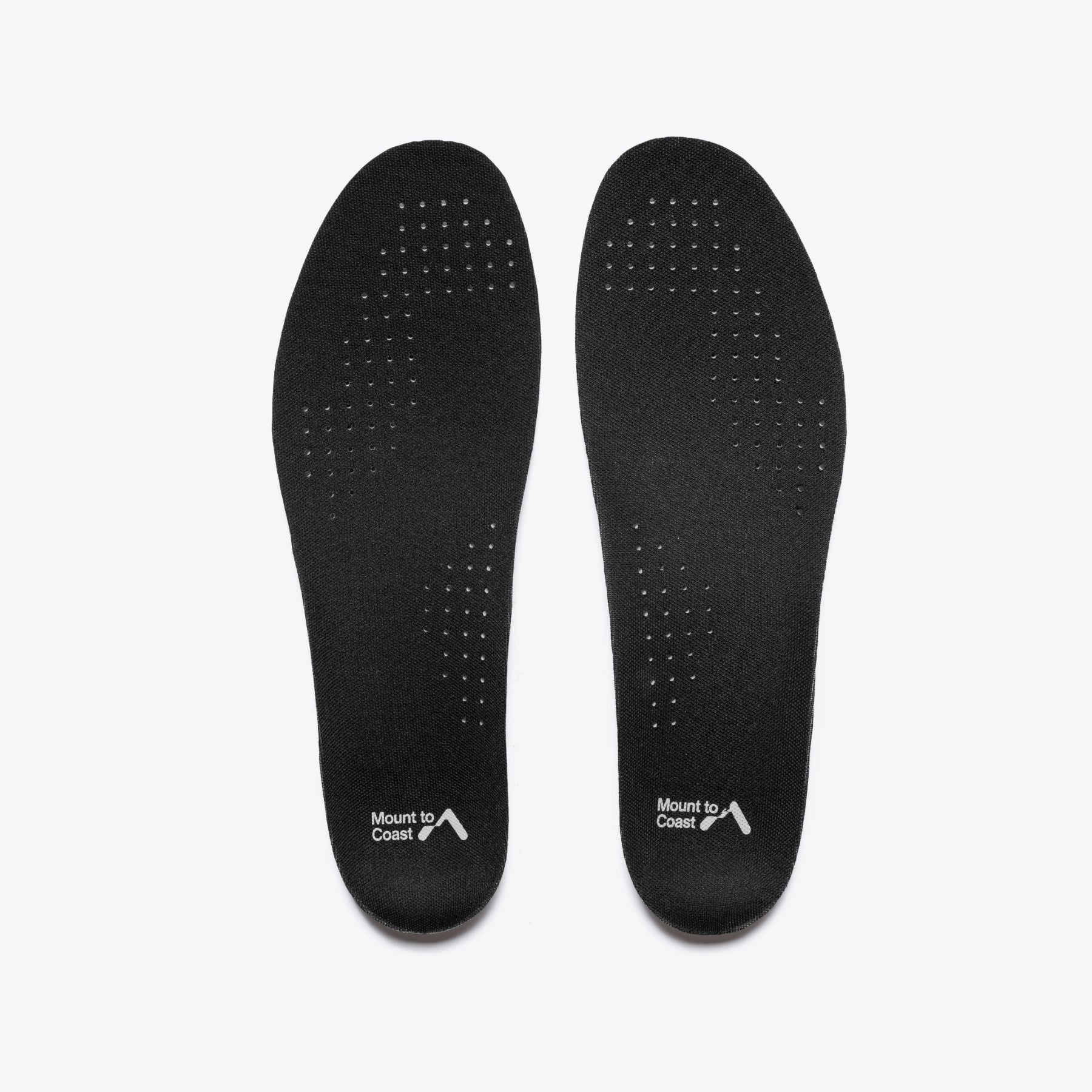 Mount to Coast T1 trail running shoe insoles. Black, with ventilation holes, brand logo. For long-distance trail running.
#Color_tephra