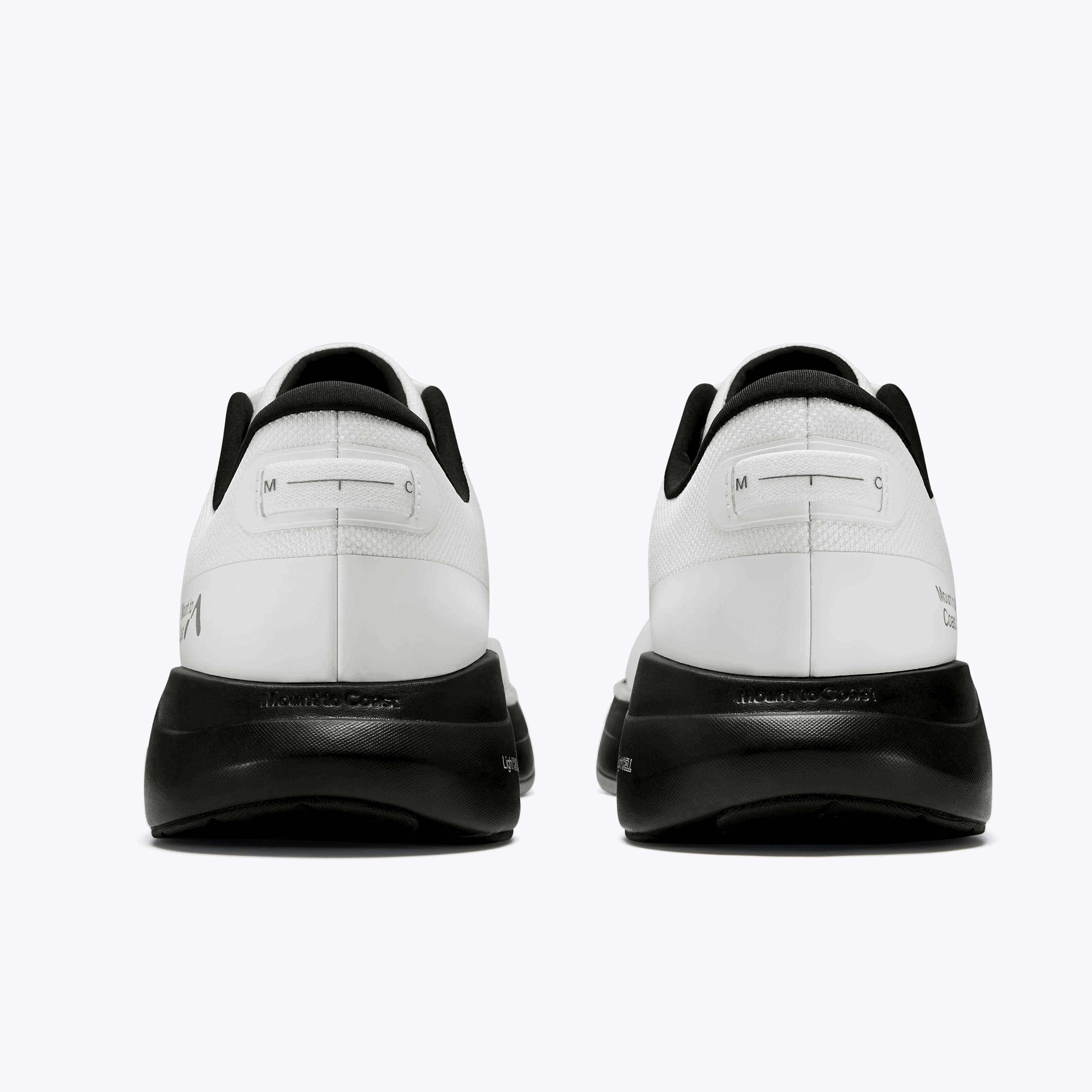 P1 running shoes rear view, showcasing 3D Archrail tech & Mount to Coast logo. #Color_white|black