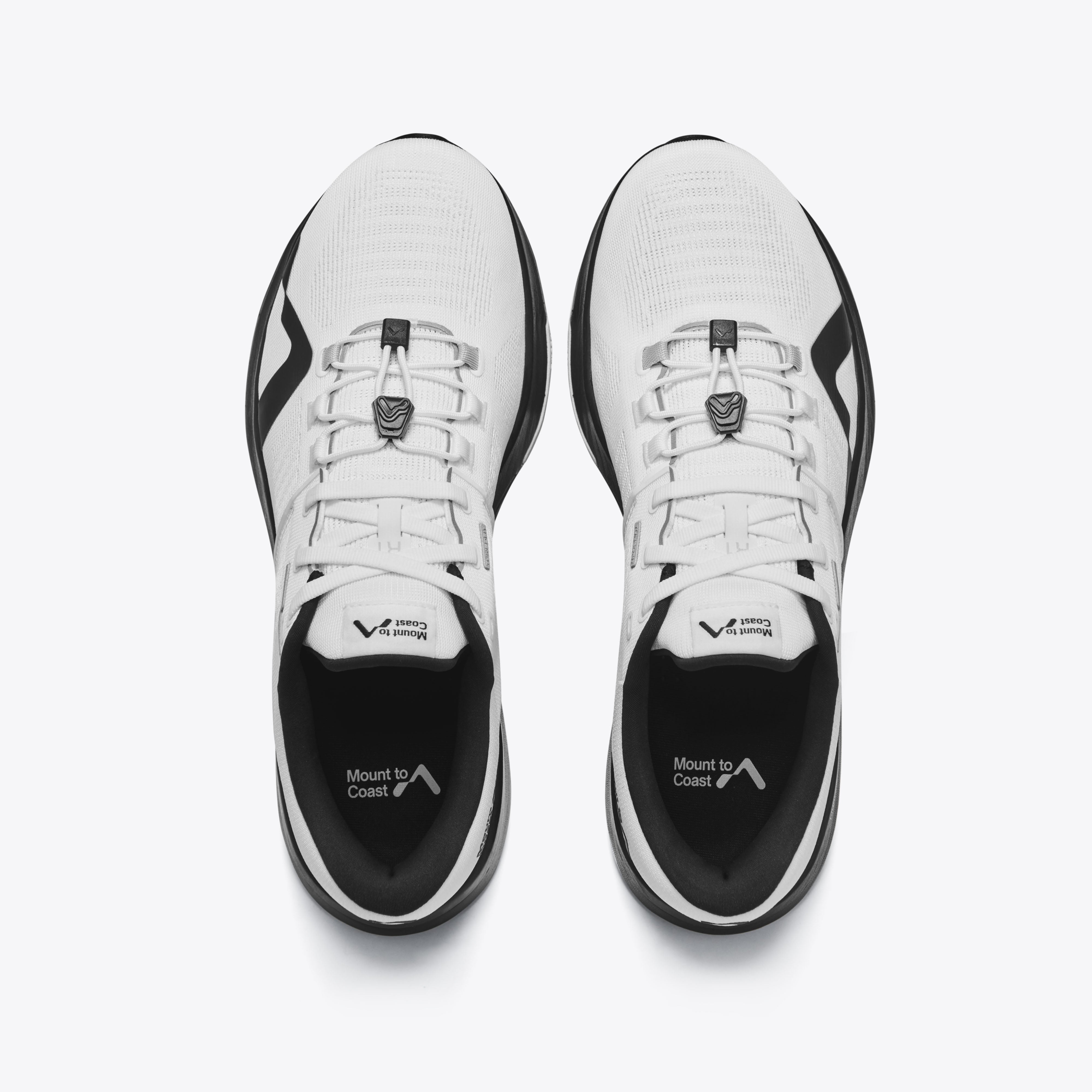 Mount to Coast R1 road running shoe, white and black design for ultramarathons, top view. #Color_white|black