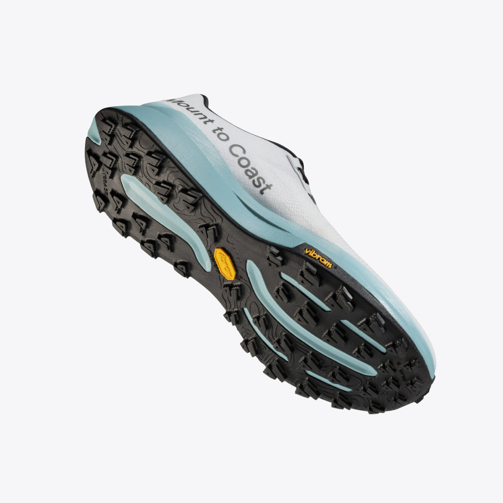 Mount to Coast T1 trail running shoe with aqua midsole and Vibram outsole, designed for trail performance.